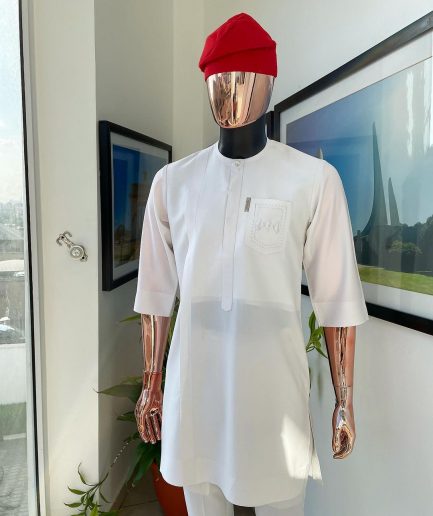 A White, front flap, triple ruffle pocket design & Swarovski button details african traditional senator kaftan native.
