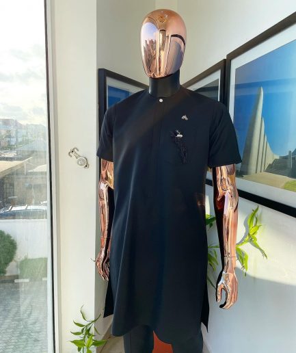 A Charcoal black, front flap, roaring tiger patch design and Swarovski button details african traditional senator kaftan native.