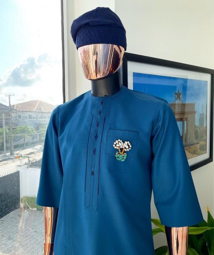 A sapphire blue, front flap, embroidery square rectangle flap and pocket design African traditional senator kaftan native.