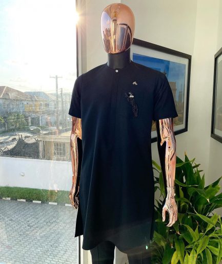 A Charcoal black, front flap, roaring tiger patch design and Swarovski button details african traditional senator kaftan native.