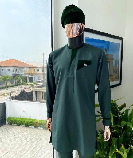 A reloaded British racing green, Monochrome embroidery with soaked Italian velvet detailing long sleeve Kaftan and sokoto