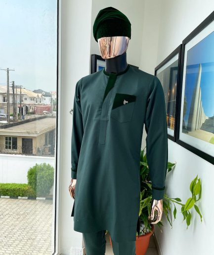 A reloaded British racing green, Monochrome embroidery with soaked Italian velvet detailing long sleeve Kaftan and sokoto