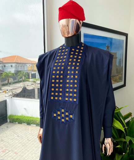 A reloaded midnight blue, connected square embroidery design with matching gold and red Swarovski stone details agbada