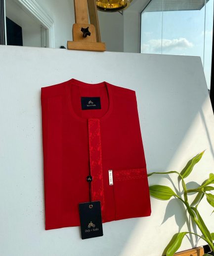 A tomato red, slanted vertical front flap & pocket embroidery detailing african traditional senator kaftan native.
