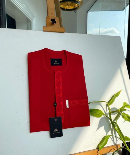 A tomato red, slanted vertical front flap & pocket embroidery detailing african traditional senator kaftan native.