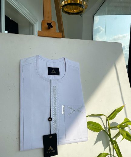 A white, dotted and covered square embroidery detailing african traditional senator kaftan native.