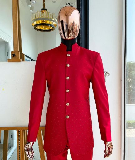 A Crimson red safari suit with matching Swarovski stones detailing