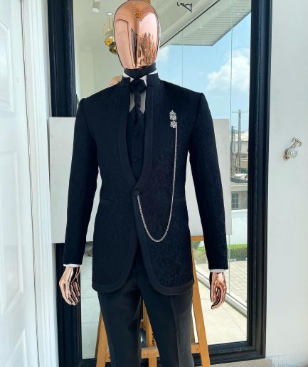 A Reloaded “Pope” monochrome charcoal black single button bishop neck suit