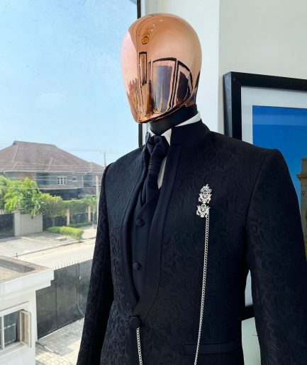 A Reloaded “Pope” monochrome charcoal black single button bishop neck suit