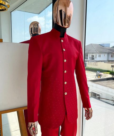 A Crimson red safari suit with matching Swarovski stones detailing