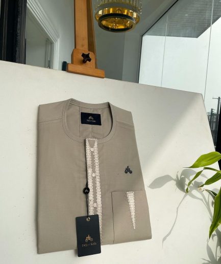 A tortilla brown, connected triangle front flap, and pocket embroidery detailing African traditional senator Kaftan native