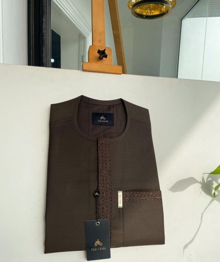 A Umber brown, rectangle lanes and dotted front flap and pocket embroidery detailing African traditional senator kaftan native.
