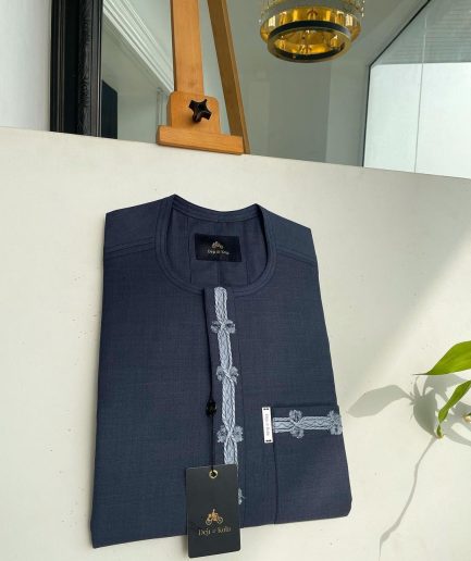 A Steel blue Senator kaftan with thick feathers front flap pocket embroidery detailing african traditional native.
