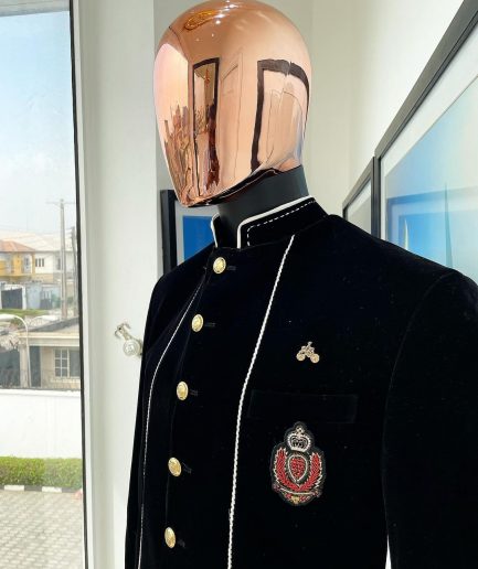 A charcoal black Soaked Italian velvet, long sleeve with woven white tread taping safari suit