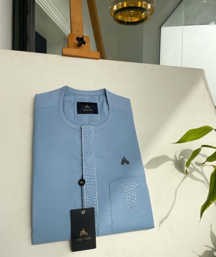 A Baby blue Senator kaftan with bridge and lane dotted front flap & pocket embroidery detailing African traditional native.