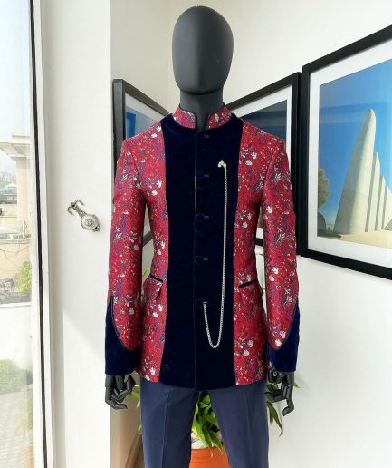 A Royal Navy blue, white and red splashed Mandarin Jacquard safari tuxedo royal suit