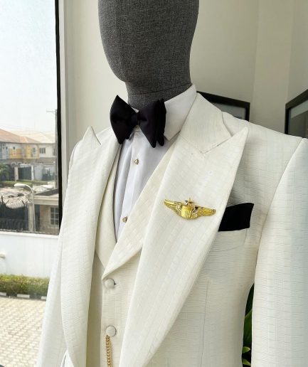An Ivory White, Peak Lapel, Infinity Line And Square Patterned Jacquard Suit
