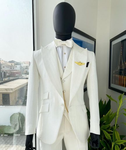An Ivory White, Peak Lapel, Infinity Line And Square Patterned Jacquard Suit