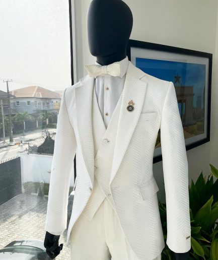 An Ivory white, notch lapel, infinity “maze” line Japanese patterned jacquard suit