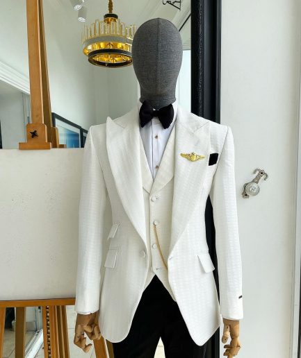An Ivory White, Peak Lapel, Infinity Line And Square Patterned Jacquard Suit