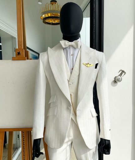 An Ivory White, Peak Lapel, Infinity Line And Square Patterned Jacquard Suit