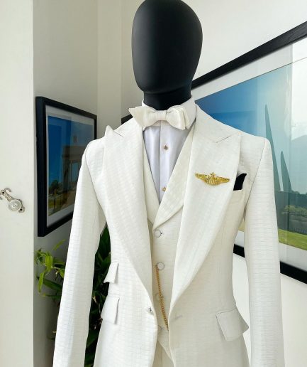 An Ivory White, Peak Lapel, Infinity Line And Square Patterned Jacquard Suit