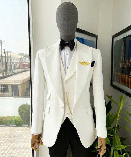 An Ivory White, Peak Lapel, Infinity Line And Square Patterned Jacquard Suit