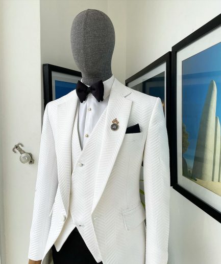 An Ivory white, notch lapel, infinity “maze” line Japanese patterned jacquard suit.