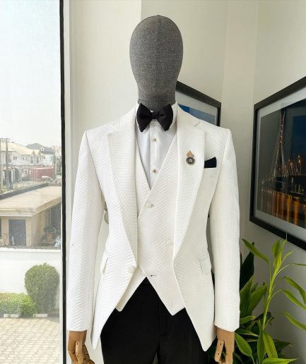 An Ivory white, notch lapel, infinity “maze” line Japanese patterned jacquard suit.