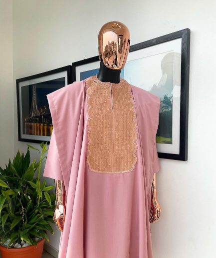 A Flamingo pink, monochrome spiral embroidery detailing Agbada