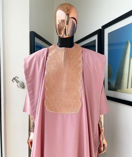 A Flamingo pink, monochrome spiral embroidery detailing Agbada
