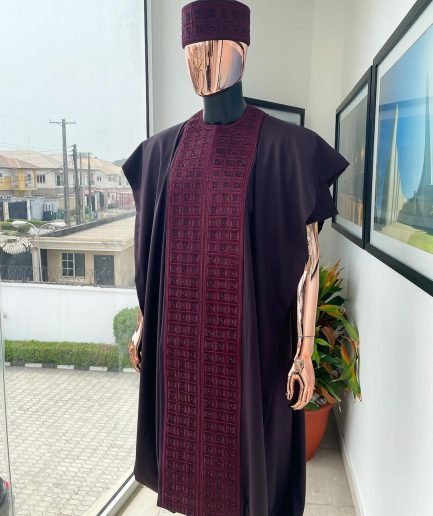 An Umber brown, connected square embroidery design with matching black and brown Swarovski stone details agbada, matching hat, buba & sokoto
