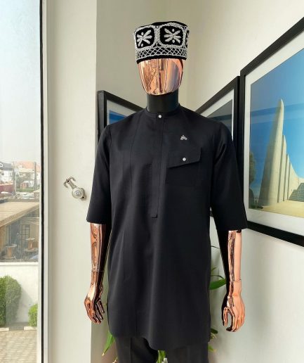 A Charcoal black, slanting combat pocket, front flap with clear view swarovski button detailing african traditional senator kaftan native.