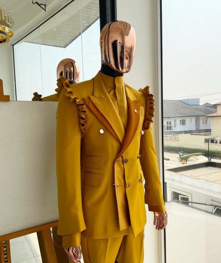 A “Made in Lagos” Wing Flare, Quad peak lapel, triple breasted metallic jacquard blazer suit