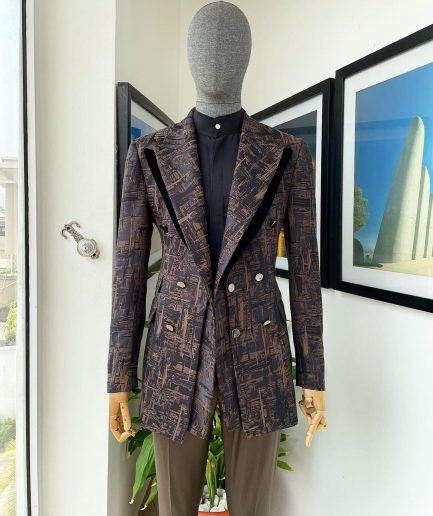 A “Made In Lagos”, Quad peak lapel, triple breasted metallic jacquard blazer suit