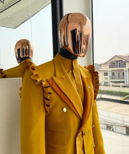 A “Made in Lagos” Wing Flare, Quad peak lapel, triple breasted metallic jacquard blazer suit