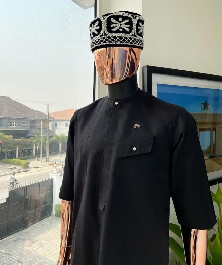 A Charcoal black, slanting combat pocket, front flap with clear view swarovski button detailing african traditional senator kaftan native.