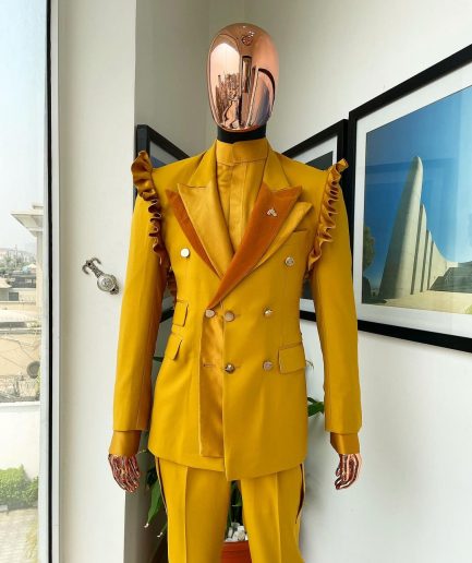 A “Made in Lagos” Wing Flare, Quad peak lapel, triple breasted metallic jacquard blazer suit