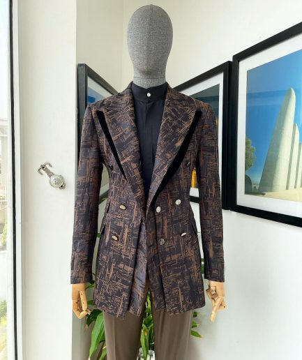 A “Made In Lagos”, Quad peak lapel, triple breasted metallic jacquard blazer suit