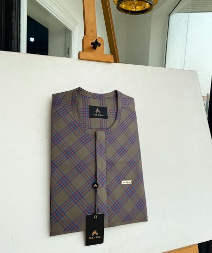 A windowpane tortilla brown with orange and navy blue stripes, a front flap detailing African traditional senator kaftan native.