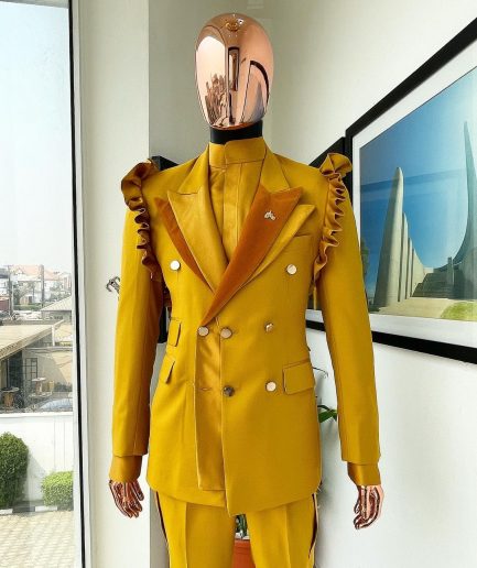 A “Made in Lagos” Wing Flare, Quad peak lapel, triple breasted metallic jacquard blazer suit