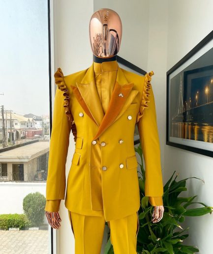 A “Made in Lagos” Wing Flare, Quad peak lapel, triple breasted metallic jacquard blazer suit