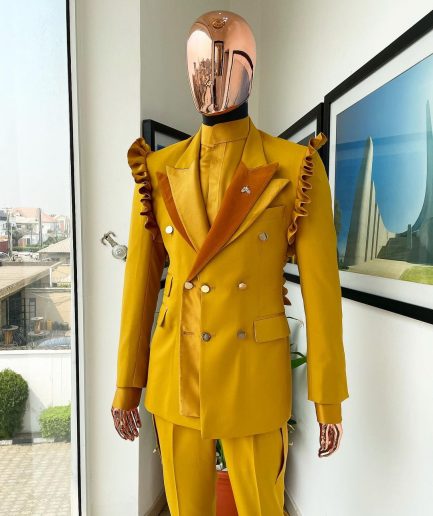 A “Made in Lagos” Wing Flare, Quad peak lapel, triple breasted metallic jacquard blazer suit