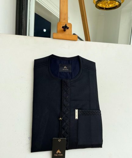 An Ebony black, Star dotted front flap and pocket embroidery detailing african traditional senator kaftan native.