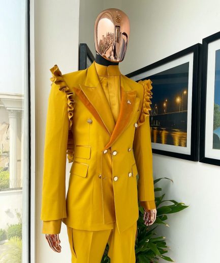 A “Made in Lagos” Wing Flare, Quad peak lapel, triple breasted metallic jacquard blazer suit