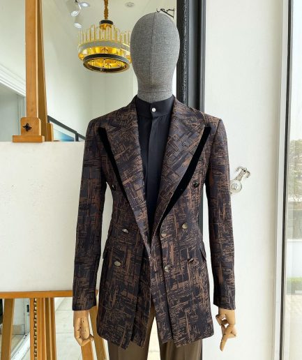 A “Made In Lagos”, Quad peak lapel, triple breasted metallic jacquard blazer suit