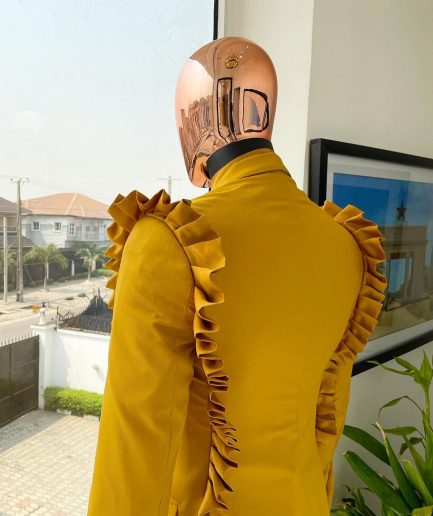 A “Made in Lagos” Wing Flare, Quad peak lapel, triple breasted metallic jacquard blazer suit