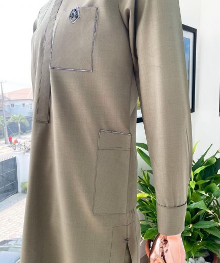 A Tortilla brown, black Swarovski button with purple paisley detailing with side patch pocket african traditional senator kaftan native.