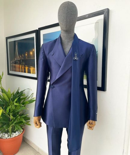 A Mikado Silk “rumble in jungle”, wrap Notch lapel, slant sache blazer suit.