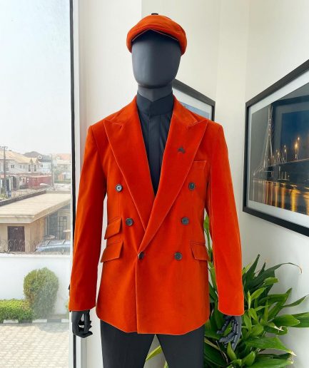A vermillion Orange, soaked Italian velvet, double breasted, Lower Cut suit